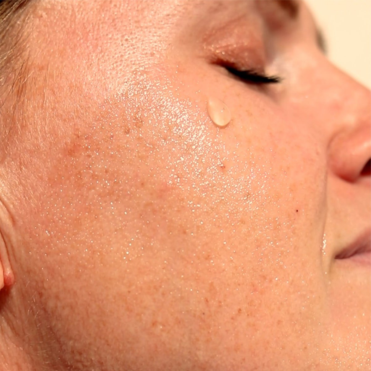 Product swatch of ManukaRx Gentle Oil Cleanser on woman's face