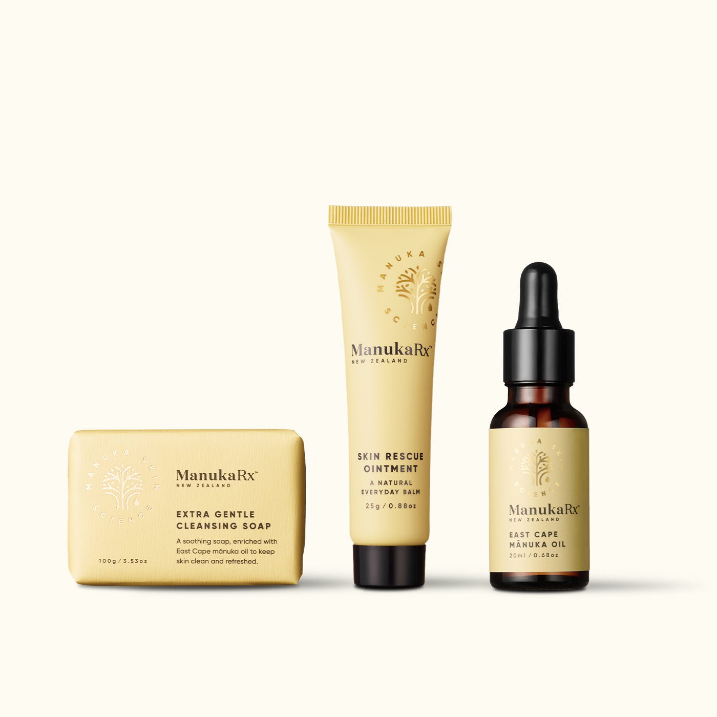 Skincare gift set displayed in front of a decorated Christmas tree.